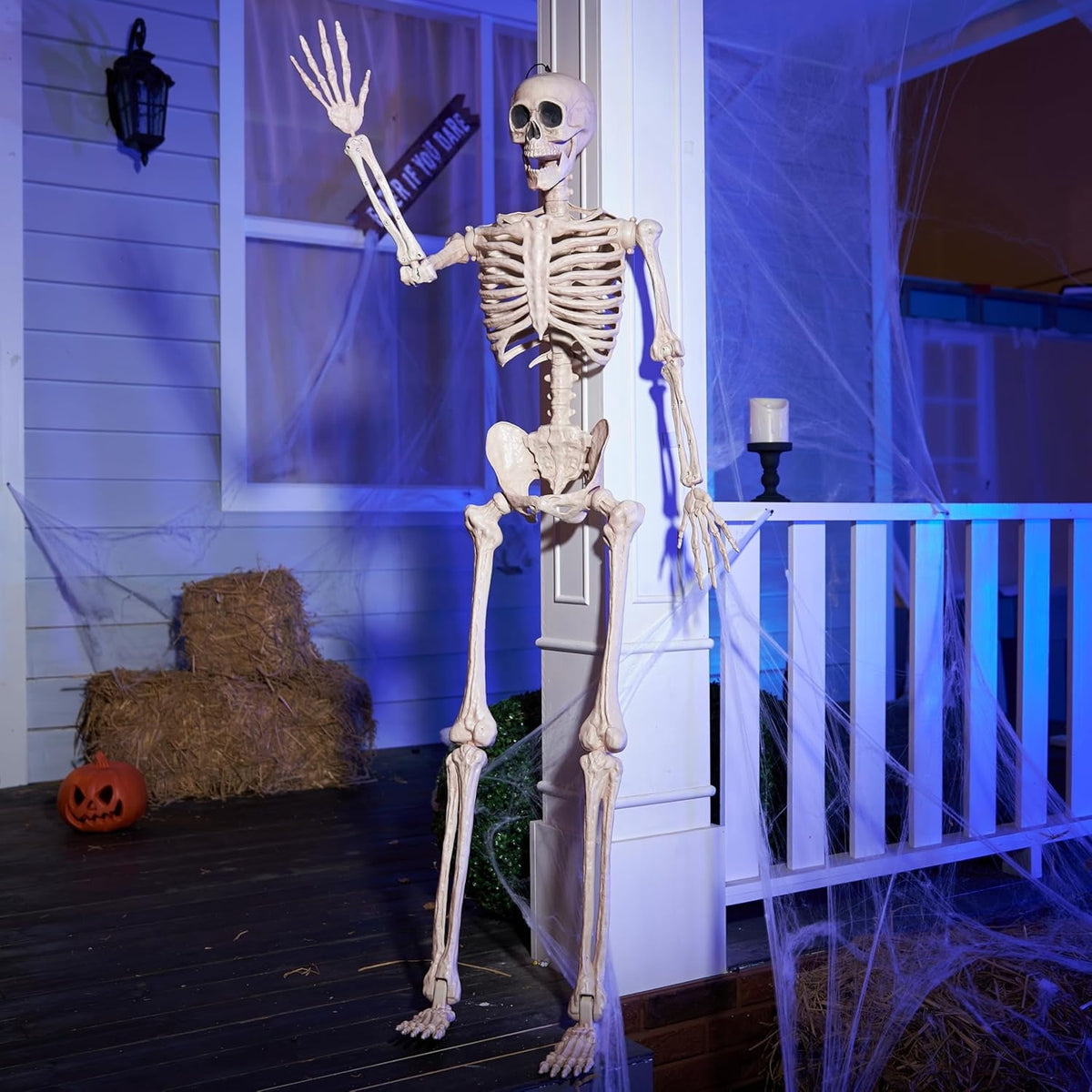 Joyfy 24 Inch Halloween Skeleton Decor with LED Light Eyes,Posable Skeleton Halloween Prop Full Body with Movable Joints for Haunted House Indoor Outdoor Decoration Spooky Decor